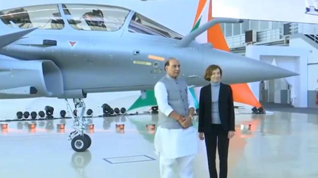 India's Defence Minister Rajnath Singh receives India’s first Rafale fighter jet. (Photo: screengrab)