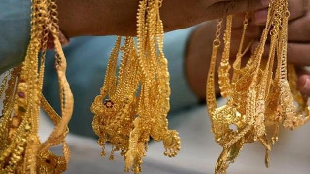 Chennai: A sales person shows gold ornaments at a jewellery shop, on the occasion of 'Akshaya Tritiya', in Chennai, Tuesday, May 7, 2019. (PTI Photo) (PTI5_7_2019_000077B)(PTI FILE/ Representative Image)