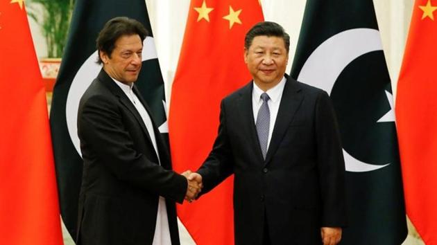 Chinese President Xi Jinping with Pakistani Prime Minister Imran Khan in Beijing.(REUTERS FILE PHOTO.)