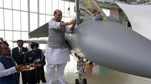 India's Defence Minister Rajnath Singh blesses the first Rafale fighter to the Indian Air Force.(Reuters Photo)