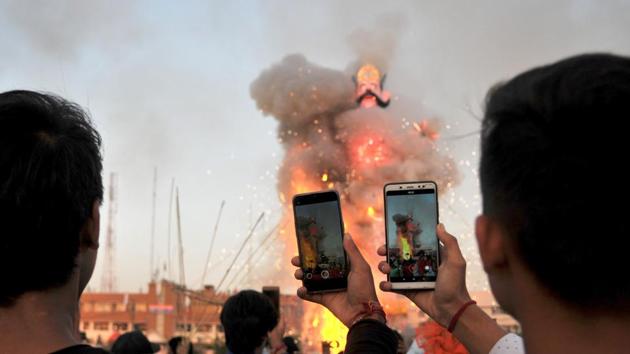 An effigy of Ravana’s son Meghanada goes up in flames marking the end of Dussehra festival in Jammu. (Nitin Kanotra / HT Photo)