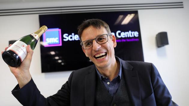 Swiss scientist Didier Queloz celebrates with a champagne at a news conference, following the announcement he wins the 2019 Nobel Prize for Physics, in London, Britain. (REUTERS) Swiss scientist Didier Queloz celebrates with a champagne at a news conference, following the announcement he wins the 2019 Nobel Prize for Physics, in London, Britain. (REUTERS)