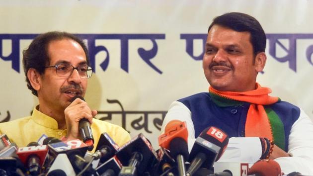 Maharashtra Chief Minister Devendra Fadnavis with Shiv Sena Chief Uddhav Thackeray announces alliance between the two parties for the upcoming assembly election in the state, in Mumbai, Friday, Oct. 4, 2019. (PTI) Maharashtra Chief Minister Devendra Fadnavis with Shiv Sena Chief Uddhav Thackeray announces alliance between the two parties for the upcoming assembly election in the state, in Mumbai, Friday, Oct. 4, 2019. (PTI)
