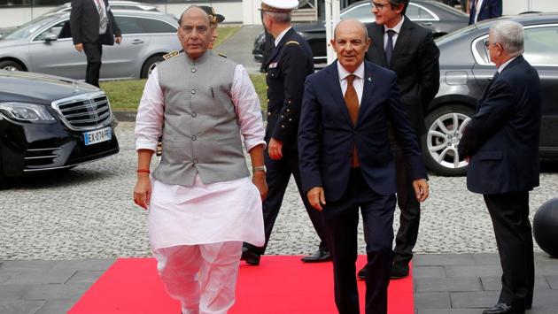 India's Defence Minister Rajnath Singh and Dassault Aviation Chairman and CEO Eric Trappier arrive to visit the assembly line for Indian Air Force Rafale fighter jets before a ceremony at the factory of French aircraft manufacturer Dassault Aviation in Merignac near Bordeaux. (Photo: REUTERS)