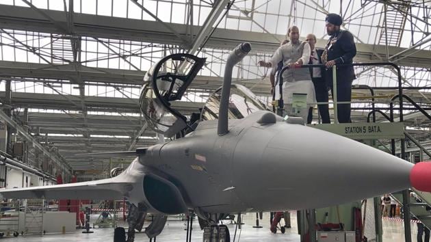 Defense Minister Rajnath Singh inspects a Rafale Jet at its Dassault Aviation assembly line in Bordeaux, France. (Photo: PTI)