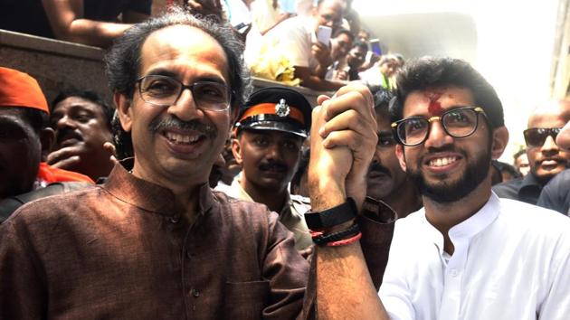 Shiv Sena BJP candidate Aditya Thackarey with his father and party chief Uddhav Thackarey after filling the nomination for Maharashtra assembly election. (Anshuman Poyrekar/HT Photo) Shiv Sena BJP candidate Aditya Thackarey with his father and party chief Uddhav Thackarey after filling the nomination for Maharashtra assembly election. (Anshuman Poyrekar/HT Photo)
