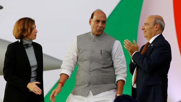 French Defence Minister Florence Parly, India's Defence Minister Rajnath Singh and Eric Trappier, Chairman and CEO of Dassault Aviation, attend a ceremony for the delivery of the first Rafale fighter to the Indian Air Force at the factory of French aircraft manufacturer Dassault Aviation in Merignac near Bordeaux, France. (Photo: REUTERS)