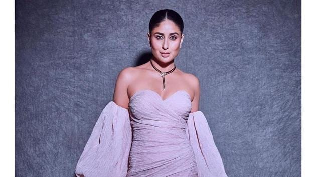 Kareena Kapoor Khan in a peach gown with a sweetheart neckline and puff sleeves. The serpent neckpiece is a nice addition to the outfit(Photo: Instagram/MOHITRAI)