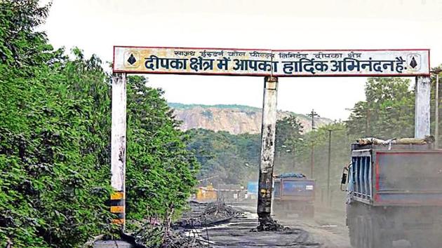 Trucks at the entry point into Dipka town.(HT PHOTO)