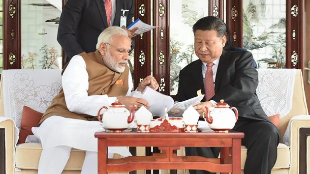 Wuhan, China: Prime Minister Narendra Modi with Chinese President Xi Jinping inside a house boat, in Wuhan’s East Lake, China on Saturday. PTI Photo/PIB(PTI4_28_2018_000026A)(PTI)