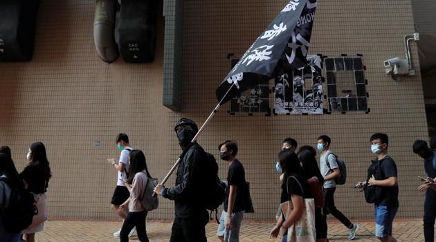 Students at Hong Kong Baptist University take part in a rally after police entered the campus on Sunday while chasing protesters, in Hong Kong, China October 8, 2019.(REUTERS) Students at Hong Kong Baptist University take part in a rally after police entered the campus on Sunday while chasing protesters, in Hong Kong, China October 8, 2019.(REUTERS)
