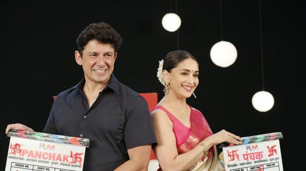 Madhuri Dixit and husband Dr Nene pose at the launch of Panchak. Madhuri Dixit and husband Dr Nene pose at the launch of Panchak.