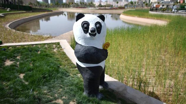 Even sites featuring shrines or the tombs of famous individuals were not spared. In Aksu, local authorities turned an enormous graveyard where prominent Uighur poet Lutpulla Mutellip was buried into “Happiness Park,” with fake pandas, a children’s ride, and a man-made lake. Mutellip’s grave was like “a modern day shrine for most nationalist Uighurs, patriotic Uighurs,” recalled Ilshat Kokbore, who visited the tomb in the early 90s and now resides in the US. (Hector Retamal / AFP)