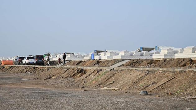 A view of a new cemetery built on the outskirts of Aksu, Xinjiang where bodies from a destroyed Uighur graveyard were moved. Aziz Isa Elkun, a Uighur activist in Britain whose father was buried in one of the many destroyed cemeteries in Shayar, agreed: “If you want to build new graves then you can, but you do not need to destroy the old ones.” It is clear that human remains have been left behind in the process. (Hector Retamal / AFP)