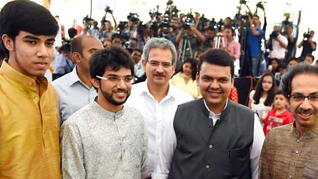 Maharashtra CM Devendra Fadnavis along with Tejas and Aditya Thackeray.(PTI Photo)