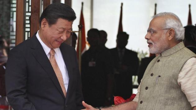 Indian Prime Minister Narendra Modi, right, welcomes Chinese President Xi Jinping, upon his arrival at a hotel in Ahmadabad, India. (File photo: AP) Indian Prime Minister Narendra Modi, right, welcomes Chinese President Xi Jinping, upon his arrival at a hotel in Ahmadabad, India. (File photo: AP)