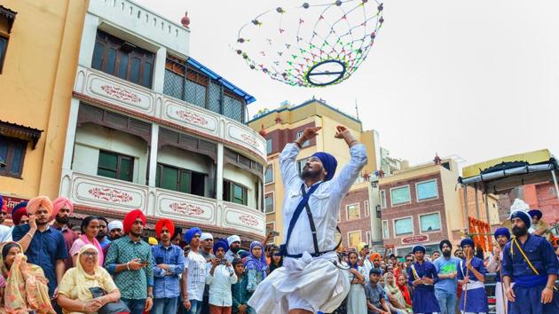 A youth performs martial arts 'Gatka' near the Sri Harmandir Sahib (Golden Temple) during the 'Nagar Kirtan' procession to mark the 550th birth anniversary of Guru Nanak Dev, at the Golden Temple in Amritsar, Aug 2, 2019.(PTI File) A youth performs martial arts 'Gatka' near the Sri Harmandir Sahib (Golden Temple) during the 'Nagar Kirtan' procession to mark the 550th birth anniversary of Guru Nanak Dev, at the Golden Temple in Amritsar, Aug 2, 2019.(PTI File)