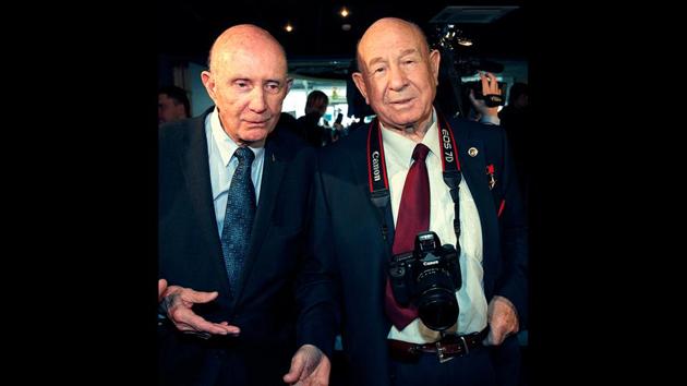 Retired NASA astronaut Thomas Stafford (L) and retired cosmonaut Alexei Leonov visit an exhibition dedicated to the 50th anniversary of the first man in space, in Moscow, on April 11, 2011. Born in Siberia, the youngest of eight children, Leonov became a fighter pilot before being selected as one of the first potential cosmonauts. He was a friend of Yuri Gagarin, who became the first man in space in 1961 and trained with him. (Alexander Zemlianichenko / AP File)