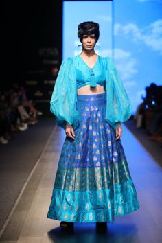 A model walks for Sanjukta Dutta’s collection titled Aakaash inspired by the infinite sky and it’s many hues of blue. 