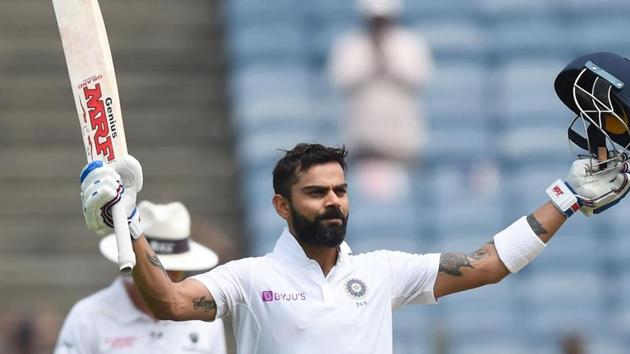 Virat Kohli celebrates after scoring ton. (PTI) Virat Kohli celebrates after scoring ton. (PTI)