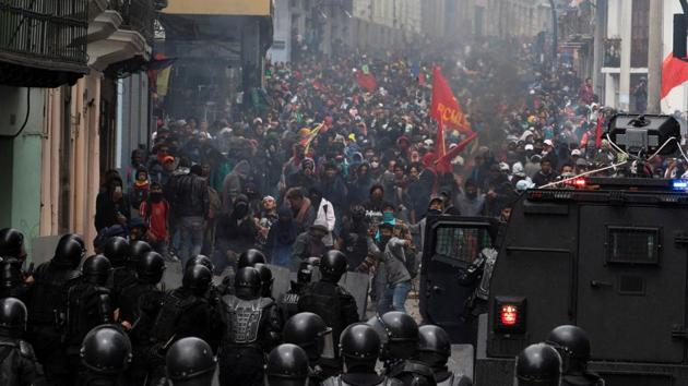 Protests swell on October 3, when the hikes come into force. Police fired tear gas at crowds hurling stones and fire bombs close to government offices in Quito. Around 30 people, several from the security forces, were wounded and dozens arrested. Buses and taxis went on strike in Quito and other cities. Subsequently Moreno declared a state of emergency, in response the strike extends into October 4 and there are more clashes, injuries and arrests. (Ivan Castaneira / REUTERS)