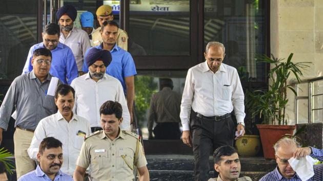 Former promoters of pharmaceutical giant Ranbaxy, Shivinder Singh, his elder brother Malvinder Singh and three others arrested by the Economic Offences Wing (EOW) of Delhi Police for allegedly misappropriating funds of Religare Finvest Limited (RFL) to the tune of ₹2,397 crore, in New Delhi on Friday. (PTI photo) Former promoters of pharmaceutical giant Ranbaxy, Shivinder Singh, his elder brother Malvinder Singh and three others arrested by the Economic Offences Wing (EOW) of Delhi Police for allegedly misappropriating funds of Religare Finvest Limited (RFL) to the tune of ₹2,397 crore, in New Delhi on Friday. (PTI photo)