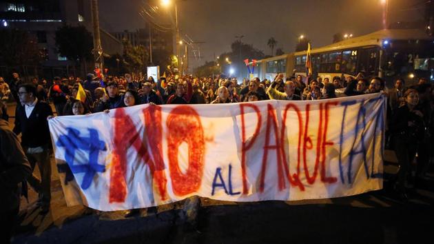 On October 2 around 300 protesters gather outside the central bank in the capital. Some demand Moreno’s resignation. (Daniel Tapia / REUTERS)