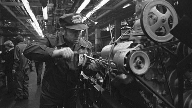 Leonov works at the main assembly department of the ZiL (”Zavod Imeni Likhachyova,” or Likhachyov Factory) car plant during a day of unpaid labour, in Moscow, on April 22, 1982. Leonov’s historic spacewalk lasted 12 minutes and nine seconds. The flight and spacewalk were successful on the whole but his return to earth nearly ended in tragedy when Leonov and another cosmonaut, Pavel Belyayev, crash-landed in Siberian woods. (AFP File)