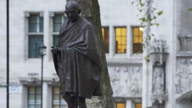 A statue of Mahatma Gandhi, in Parliament Square, London. Britain has decided to mint coin with images of Mahatma Gandhi.(AP File) A statue of Mahatma Gandhi, in Parliament Square, London. Britain has decided to mint coin with images of Mahatma Gandhi.(AP File)
