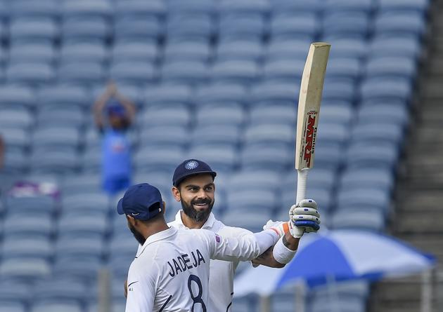 Pune: Indian cricket team Captain Virat Kohli acknowledges the crowd after scoring double century on day 2 of second India-South Africa cricket test match, at Maharashtra Cricket Association Stadium in Pune. (PTI)