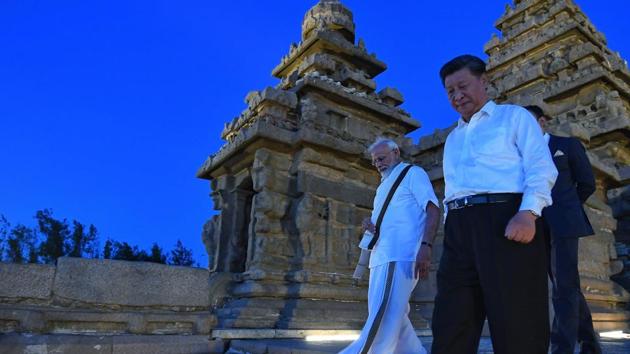 Prime Minister Narendra Modi and President Xi Jinping had a conversation, with only their translators present, at the Pancha Ratha, a monument with five chariots hewn out of solid rock, that lasted almost 15 minutes. (Twitter/@narendramodi) Prime Minister Narendra Modi and President Xi Jinping had a conversation, with only their translators present, at the Pancha Ratha, a monument with five chariots hewn out of solid rock, that lasted almost 15 minutes. (Twitter/@narendramodi)