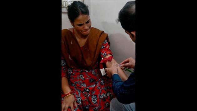 A doctor collects a blood sample from a suspected TB patient. The WHO has noticed a form of TB resistant to traditional medicines that has a mortality rate of 50 percent -- comparable to that of Ebola, highlighting the challenges that remain even after the progress made against TB in recent decades. There are an estimated 6,00,000 multidrug resistant TB cases worldwide -- and 1,35,000 in India alone. (Money Sharma / AFP)