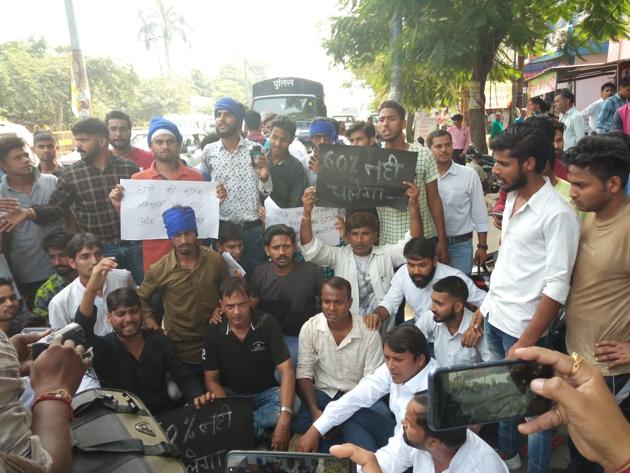 SC/ ST students protesting against the new scholarship rules in Meerut on Saturday.(HT)