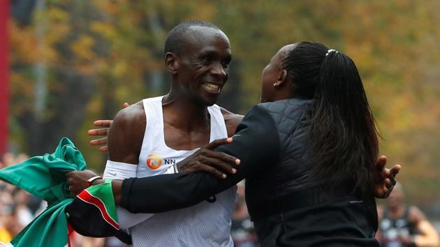 Kenya's Eliud Kipchoge, the marathon world record holder, celebrates after a successful attempt to run a marathon in under two hours in Vienna, Austria, October 12, 2019.(REUTERS)