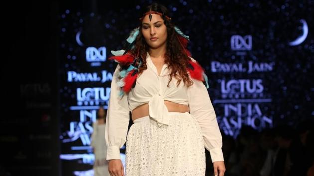 A model showcases the creation of fashion designer Payal Jain. The designer said she was in the midst of working on the collection, ‘Crescent Moon’, when she lost her father last year. (IANS)