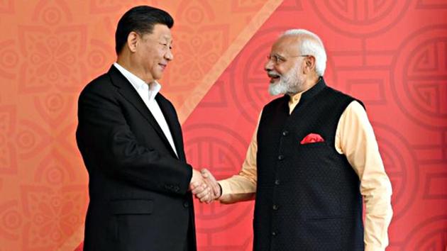 Prime Minister Narendra Modi welcomes Chinese President Xi Jinping at Taj Fisherman's Cove hotel in Kovalam, on Saturday. (ANI photo) Prime Minister Narendra Modi welcomes Chinese President Xi Jinping at Taj Fisherman's Cove hotel in Kovalam, on Saturday. (ANI photo)