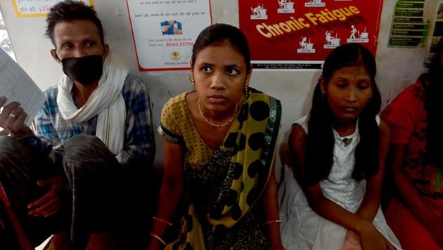 Tuberculosis (TB) patients wait for their turn to get their daily dose of medicine at a DOTS (directly observed treatment, short-course) centre in New Delhi. India continues to grapple with the disease, becoming home to a quarter of TB cases worldwide. To fight the disease, the government has set an ambitious target of overcoming the TB “epidemic” by 2025. Even though the goal seems unachievable, NGOs are providing patients with services to cure them. (Money Sharma / AFP)