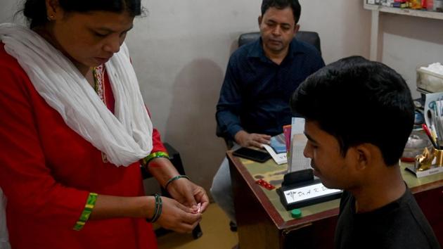 A patient is given his daily dose of medicine by a nurse at a DOTS centre. Last year, about 2.7 million new cases of TB emerged in the country. A major killer in the West until the mid-twentieth century, the disease remains a menace in developing countries and killed 4,21,000 in India in 2017 according to the World Health Organization -- more than AIDS and malaria combined. (Money Sharma / AFP)