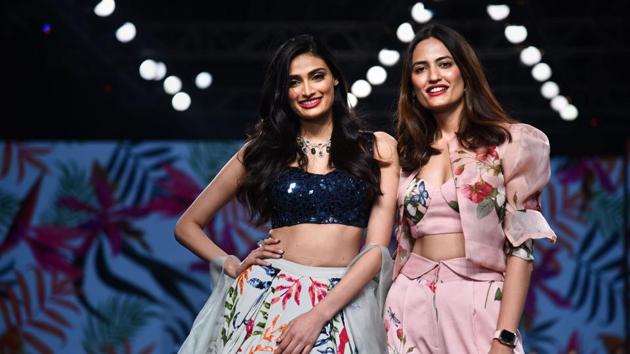New Delhi: Bollywood actor Athiya Shetty walks the ramp to showcase a creation by Mahima Mahajan during the India Fashion Week, in New Delhi, Friday. (PTI) New Delhi: Bollywood actor Athiya Shetty walks the ramp to showcase a creation by Mahima Mahajan during the India Fashion Week, in New Delhi, Friday. (PTI)