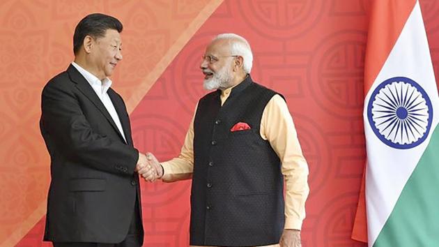 Prime Minister Narendra Modi with Chinese President Xi Jinping, at Fisherman's Cove in Kovalam near Mamallapuram .(PTI photo)