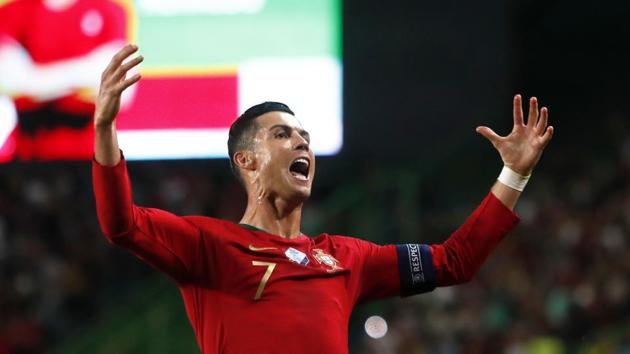 Portugal's Cristiano Ronaldo celebrates after scoring his side. (AP)