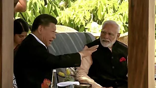 Prime Minister Narendra Modi and Chinese President Xi Jinping at Taj Fisherman's Cove hotel, in Kovalam on Saturday. (ANI Photo)