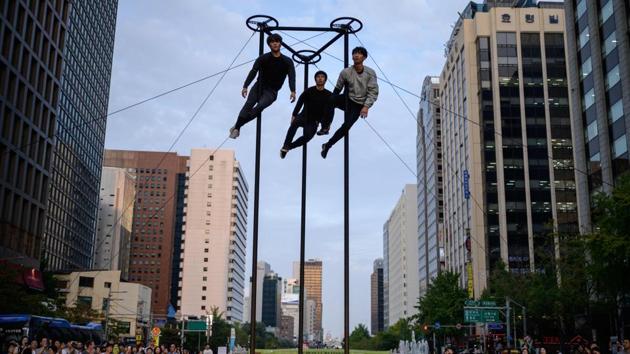 Performance group 'Force' perform a routine during the Seoul Street Arts Festival in Seoul, South Korea. - The annual Seoul Street Arts features performing groups from ten different countries and runs for four days. (Ed Jones / AFP)