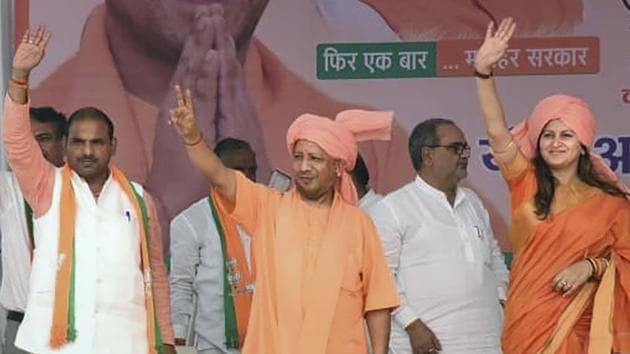Uttar Pradesh Chief Minister Yogi Adityanath waves at his supporters during a campaign ahead of Haryana Assembly polls, at Adampur, in Hisar district of Haryana, Saturday, Oct. 12, 2019. (PTI) Uttar Pradesh Chief Minister Yogi Adityanath waves at his supporters during a campaign ahead of Haryana Assembly polls, at Adampur, in Hisar district of Haryana, Saturday, Oct. 12, 2019. (PTI)