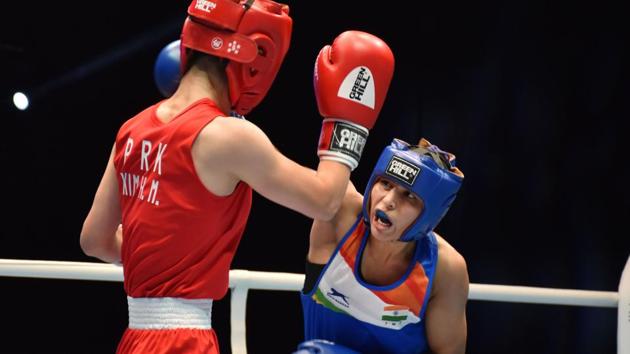 India's Manju Rani (48kg) lands a punch.(PTI)