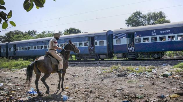 Security personnel deployed at Joda Phatak during a protest by family members of victims, who died in the train tragedy on Dussehra last year, against the state government demanding justice, in Amritsar, Punjab. At least 61 people were killed and over 70 sustained injuries in the tragic incident near Joda Phatak in Amritsar on October 19 last year. (PTI)