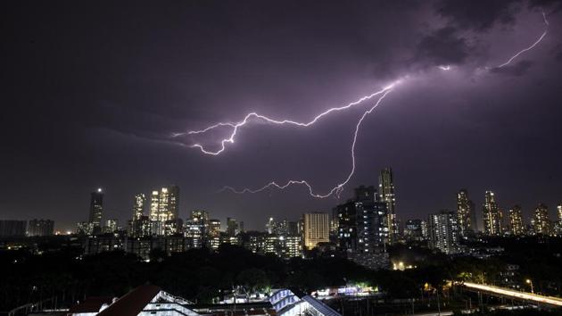 Lightning strikes the city at Parel in Mumbai, Maharashtra. (Satish Bate / HT Photo)