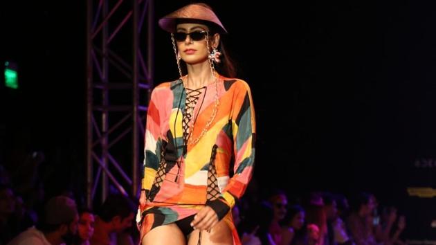 A model displays luxury holiday lifestyle wear. (IANS)
