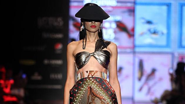 A model walks the ramp during the India Fashion Week Grand Finale. (ani)
