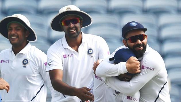 Indian players celebrate the dismissal of South Africa's Theunis de Bruyn.(PTI)